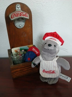 Coca-Cola Wall Mount Bottle Opener, Coasters, Mini Glass, Soda, Coin Hat, Seal - Image 1 of 2