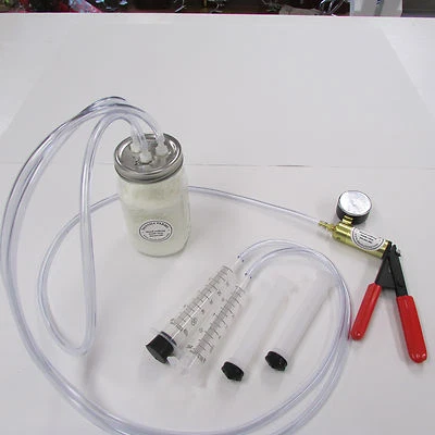  Máquina de leche al vacío manual de cabra oveja vaca botella de 1 cuarto 2 tetinas Dansha Farms tm Foto 1 de 4