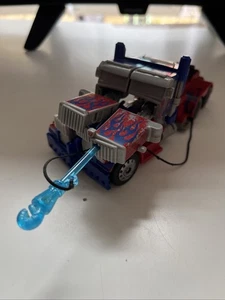 Transformers Fast Action Battlers - Power Hook Optimus Prime, schneller kostenloser Versand - Bild 1 von 2