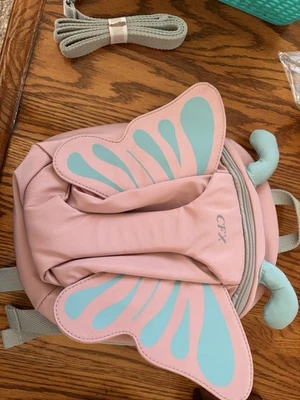 Correa mochila anti-perdida rosa mariposa para niños pequeños con asa de seguridad para salidas Foto 1 de 3
