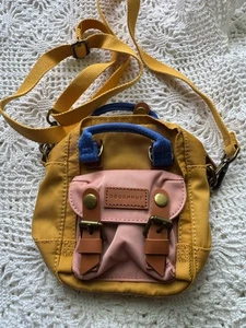 Doughnut Mini Backpack 6” H X 7” W Mustard, Pink, Royal Blue Snaps Adjustable - Picture 1 of 8