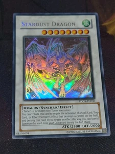 Yu-Gi-Oh! TCG Stardust Dragon TDGS-EN040 Unlimited Ghost Rare - Picture 1 of 18