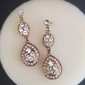 Pendientes colgantes Givenchy tono dorado con cristales transparentes forma de pera firmados - Imagen 1 de 4