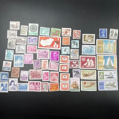 LOT OF 56 VINTAGE FOREIGN WORLDWIDE STAMPS AFRICA GERMANY ITALY CHILE CZECH - Image 1 of 3