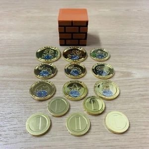 Juego de monedas de oro de plástico para Nintendo Super Mario Bros en caja de bloques retro japonés - Imagen 1 de 8