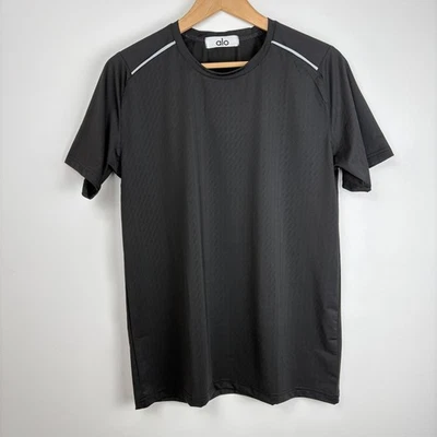 Camiseta reflectante de rendimiento de manga corta Alo Yoga para hombre talla mediana* negra Foto 1 de 4