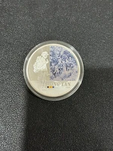 AUSTRALIA $1 2012 SILVER 1 oz Battle Long Tan Coin encased - Bild 1 von 2