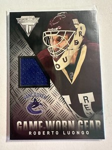 K105,677 - 2013-14 Panini Titanium Game Worn Gear #GGLU Roberto Luongo Jersey