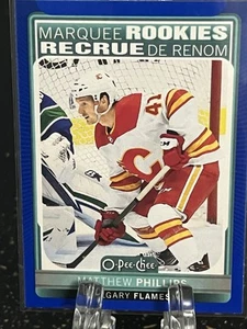 MATTHEW PHILLIPS----201-22 O PEE CHEE---BLUE BORDER----MARQUEE ROOKIE--FLAMES - Picture 1 of 2