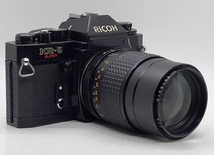 Ricoh KR-5 Super fotocamera reflex pellicola 35 mm con obiettivo zoom focale 135 mm f/1:2.8, TESTATA - Foto 1 di 18