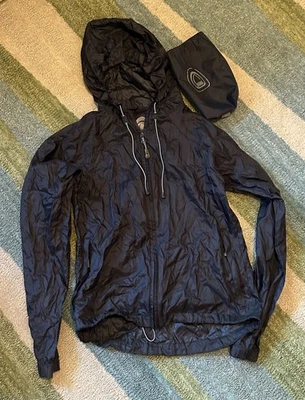 Cortavientos Sierra Designs negro para mujer XS con capucha y bolsa compacta Foto 1 de 2