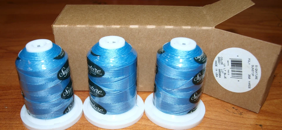 Prewound sunstop polyester thread size 69 ( 3 spools of 1 ounce ) color lt, blue - Image 1 of 1
