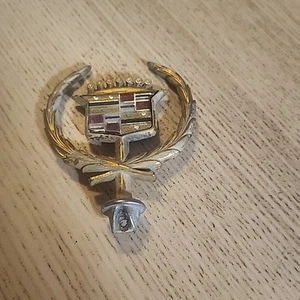 Vintage Cadillac Hood EMBLEM  BADGE NAMEPLATE SCRIPT METAL Gold - Picture 1 of 3