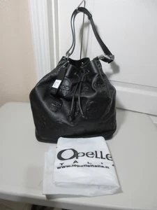 I O'PELLE EMBOSSED SKULLS DRAWSTRING BUCKET BAG        BLACK        NWT - Picture 1 of 10