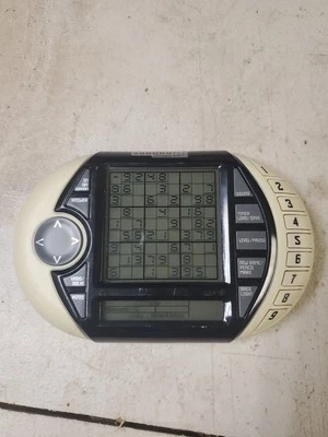 Sudoku ULTIMATE Electrónico Portátil LCD Juego de Viaje con Luz Trasera Funcionando Foto 1 de 2