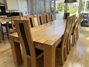Solid Wood Dining table and 10 chairs pre owned