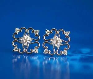 Pendientes de tachuelas de oro amarillo y blanco de 14 K con Cz - Imagen 1 de 14