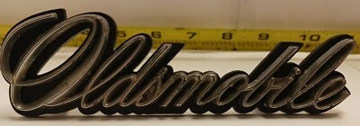 Emblema/insignia de rejilla GM 1971-1974 Oldsmobile Cutlass (219) usado fabricante de equipos originales Foto 1 de 4