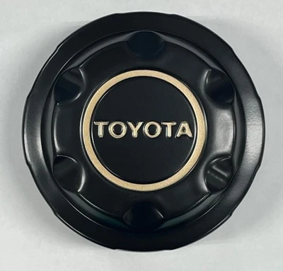 Adorno de cubo de rueda trasera genuino Toyota para Land Cruiser FJ70 90-99 42603-60053 Foto 1 de 3