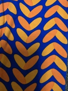 Lularoe L/XL Leggings kids-NEW-Geometric-Purple Background w/ 2 shades of Orange - Picture 1 of 3