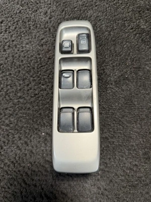 Interruptor de control de ventana eléctrica maestro Mitsubishi Montero 2001-2004 OEM plateado Foto 1 de 4