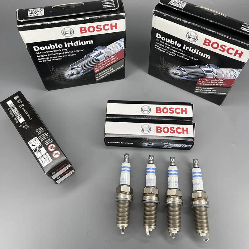 Bujía doble iridio BOSCH GENUINA 4 PIEZAS para Toyota Corolla Nissan Frontier Foto 1 de 2