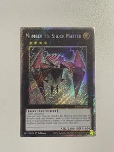 Número 16: Shock Master RA04-EN166 Platino Secreto Raro 1ª Edición Yugioh Casi Nuevo - Imagen 1 de 1