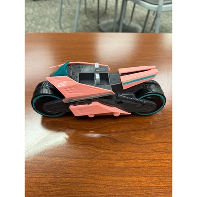 Vehículo de juguete futurista rosa verde azulado número 22 Foto 1 de 4