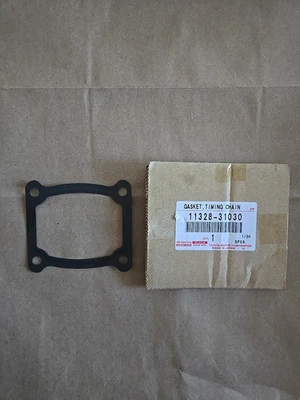 Junta de placa de cubierta de distribución de motor Toyota genuina OEM 11328-31030 Foto 1 de 2