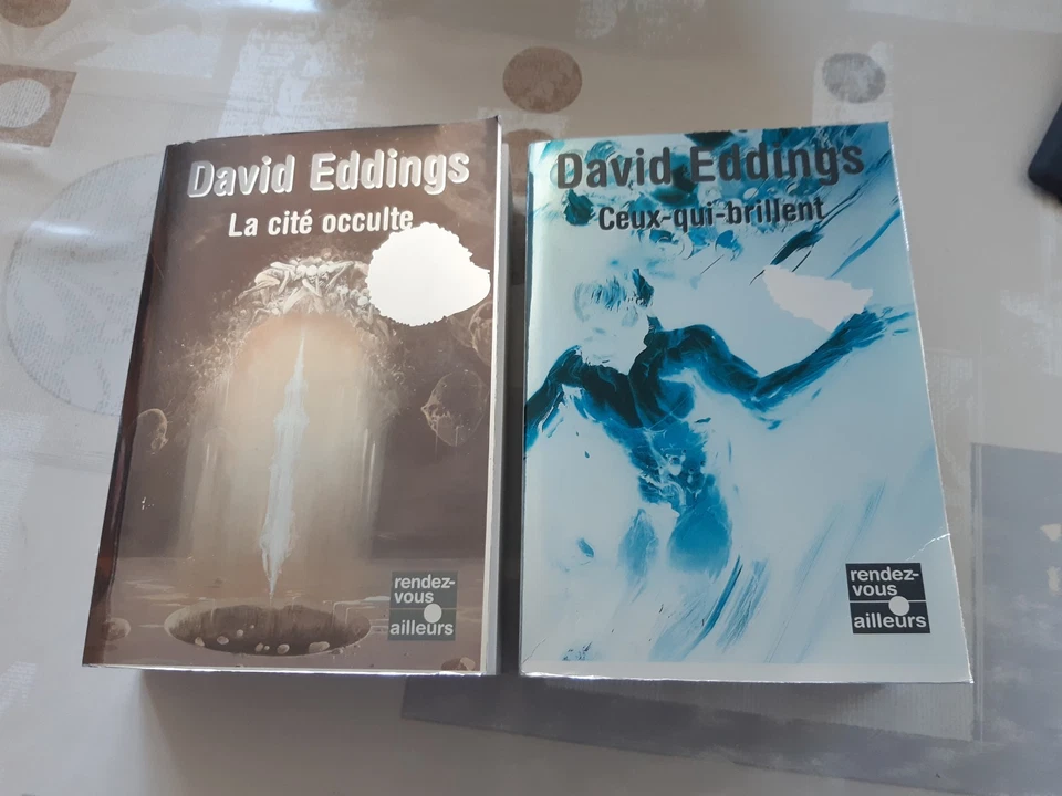 Lot 2 romans - David Eddings - Ceux qui brillent / La cité occulte - Photo 1/3
