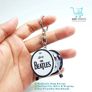 2 piezas Llavero de batería miniatura - The Beatles Band recuerdo fans del rock envío gratuito - Imagen 1 de 2