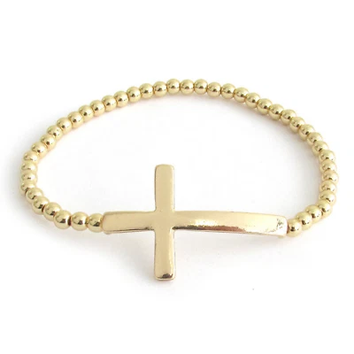 Pulsera elástica con cuentas cruzadas laterales dorada Foto 1 de 4