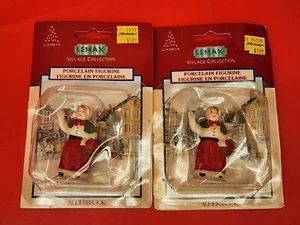 Par de estatuillas vintage Lemax Village dama con vestido rojo - Imagen 1 de 5