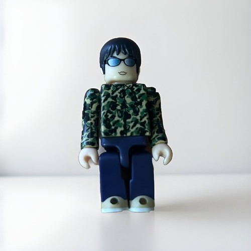 A BATHING APE (BAPE) A BATHING APE NIGO Kubrick Figure Vintage Rara Giacca Mimetica Girando Testa Occhiali