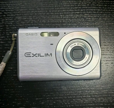 Casio Exilim EX Z70 Digitalkamera Silber Digicam 7.2 MP Zustand sehr gut - Bild 1 von 4