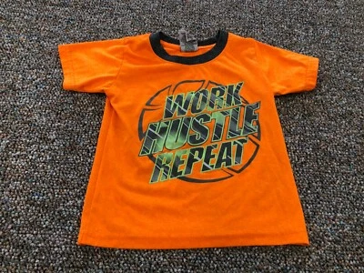 Top deportivo Tuff Guys Work Hustle Repeat 3T Foto 1 de 4
