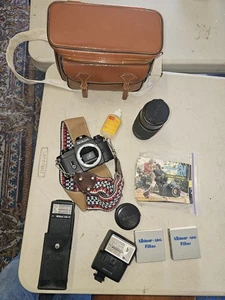 Nikon EM Kamera und Zubehör Konvolut, Nikon Objektiv Serie E, Tasche etc. - Bild 1 von 10