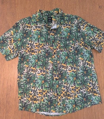 Camisa con botones RVCA fácil ajuste para hombre talla grande estampado de selva verde amarillo Foto 1 de 4