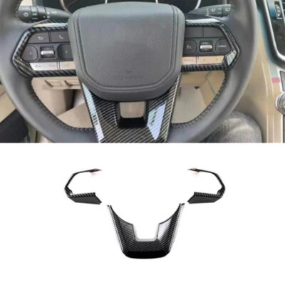 Cubierta decorativa volante ABS fibra de carbono para Toyota Land Cruiser LC300 Foto 1 de 4