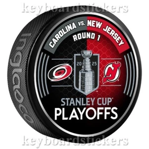 2025 Stanley Cup Playoffs Dueling Puck Carolina Hurricanes vs New Jersey Devils - Picture 1 of 2