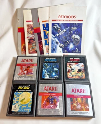 VTG Atari 2600 Lot of 6 Games w/ Manuals- Pac-Man, Asteroids, Swordquest, Combat - Image 1 of 4