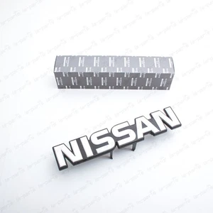 Genuine Nissan 87-99 Safari Y60 Patrol Front Radiator Grille Emblem 62890-06J00 - Picture 1 of 7