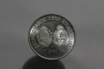 🧭 🇺🇾 URUGUAY 100 PESOS 1981 SILVER HIGH GRADE Hydroelectric dam B84 #K3833 - Image 1 of 4