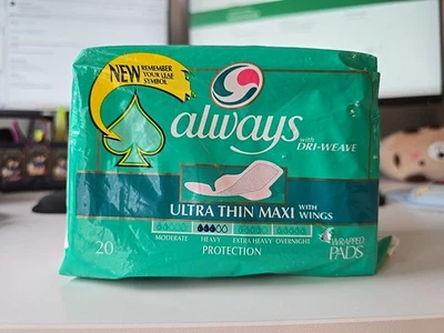 Maxi almohadillas ultradelgadas Always DriWeave 1997 de colección utilería exhibición publicidad abierta Foto 1 de 4