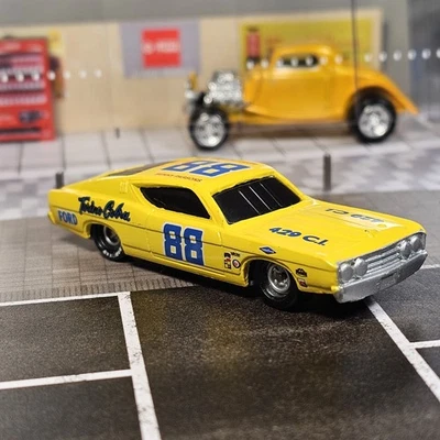 Racing Champions 1/64 Ford Gran Torino Cobra Jet #88 BENNY PARSONS NASCAR Yellow - Image 1 of 4