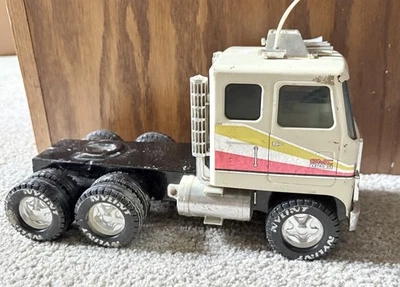 CAMIÓN TRANSPORTADOR AUTOMÁTICO NYLINT GMC ASTRO 95 DE COLECCIÓN ACERO PRENSADO  Foto 1 de 4