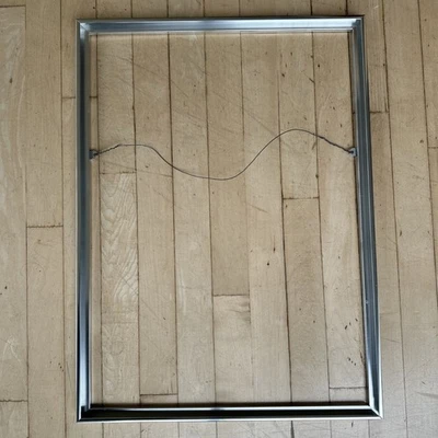 Marco de fotos personalizado de aluminio plateado con soportes y clips AMS sin vidrio 24x17,7 Foto 1 de 4