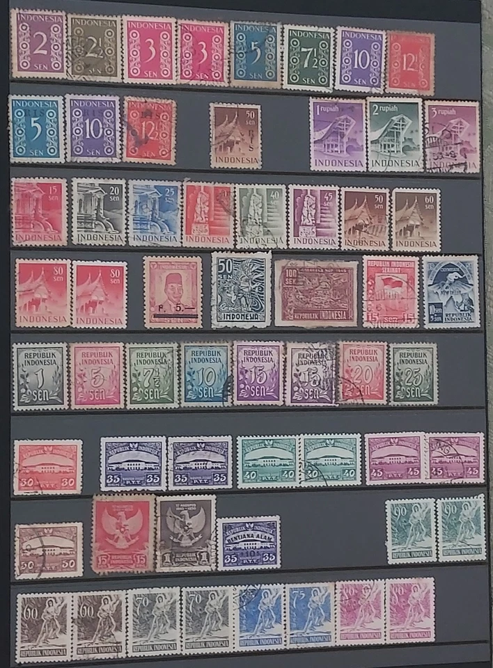 8½ album pages of stamps from Indonesia, used/unused - image 1 of 4