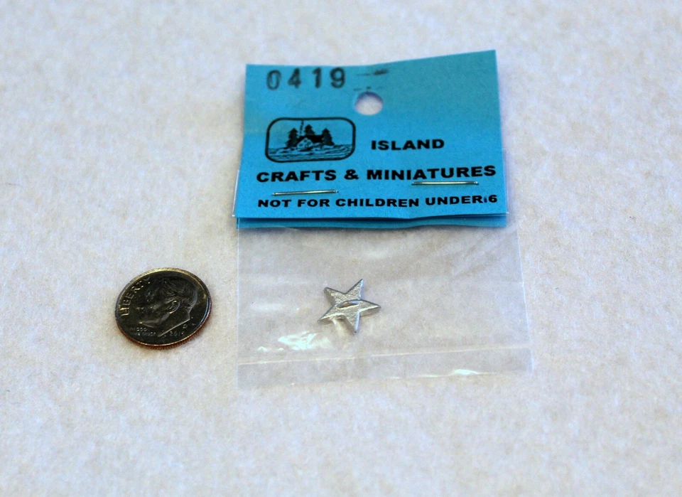 Cortador de galletas estrella de metal miniaturas para casa de muñecas Foto 1 de 1