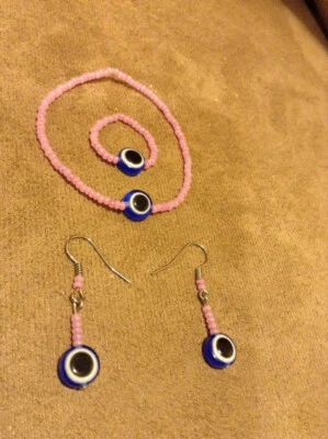 Juego completo de Mal de Ojo y Cristal Rosa: Pulsera y Anillo y Pendiente Hecho a Mano Foto 1 de 4